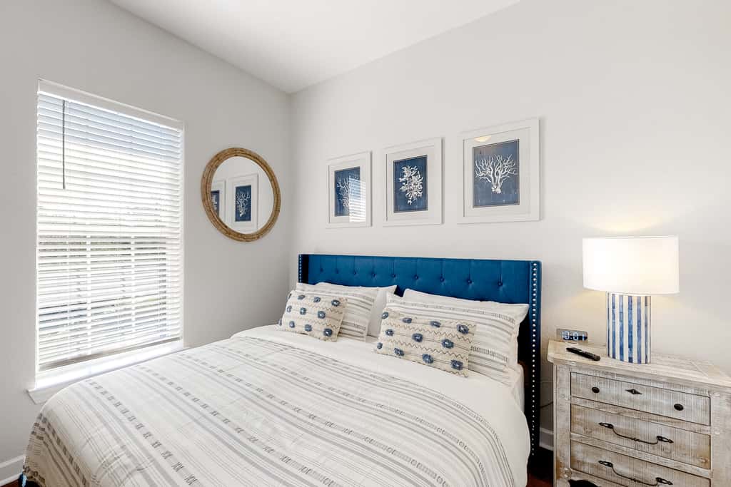 Lakefront condo with water-view balcony, private golf cart, resort pool & amenities