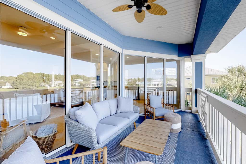 Lakefront condo with water-view balcony, private golf cart, resort pool & amenities