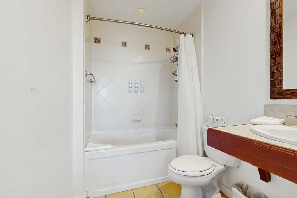 Luau getaway with pools, hot tub, beach access, & private balcony