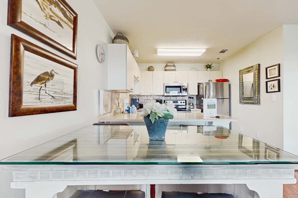 Fourth-floor, Caribbean corner condo with ocean views, pool, & hot tub