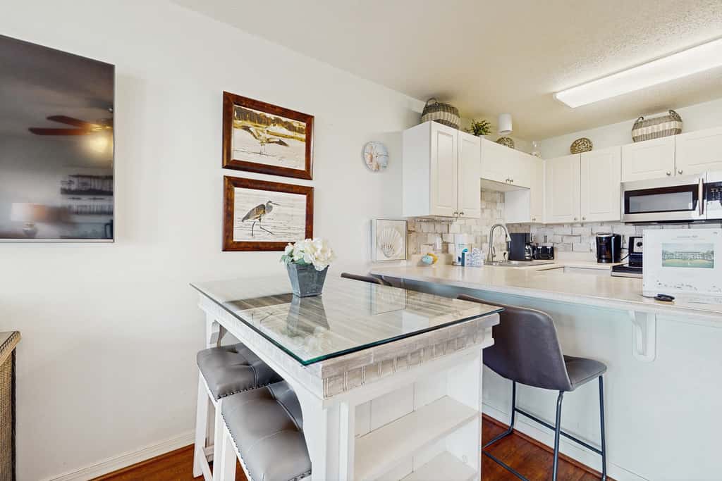 Fourth-floor, Caribbean corner condo with ocean views, pool, & hot tub