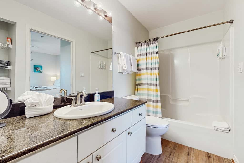 Fourth-floor, Caribbean corner condo with ocean views, pool, & hot tub