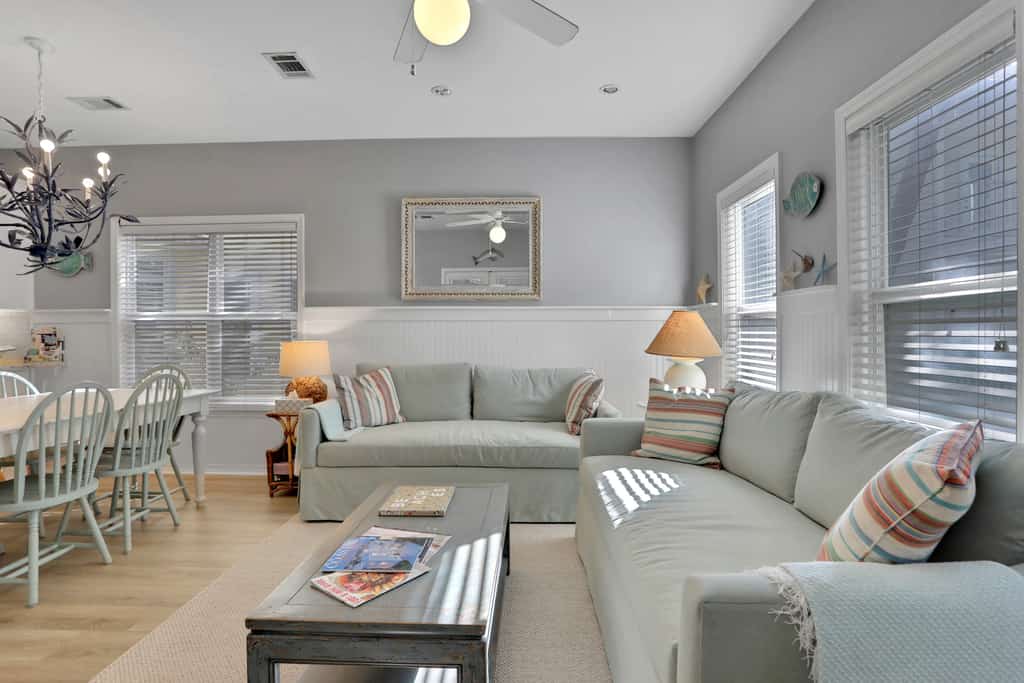Two-story home near the beach with private balconies & on-site pool