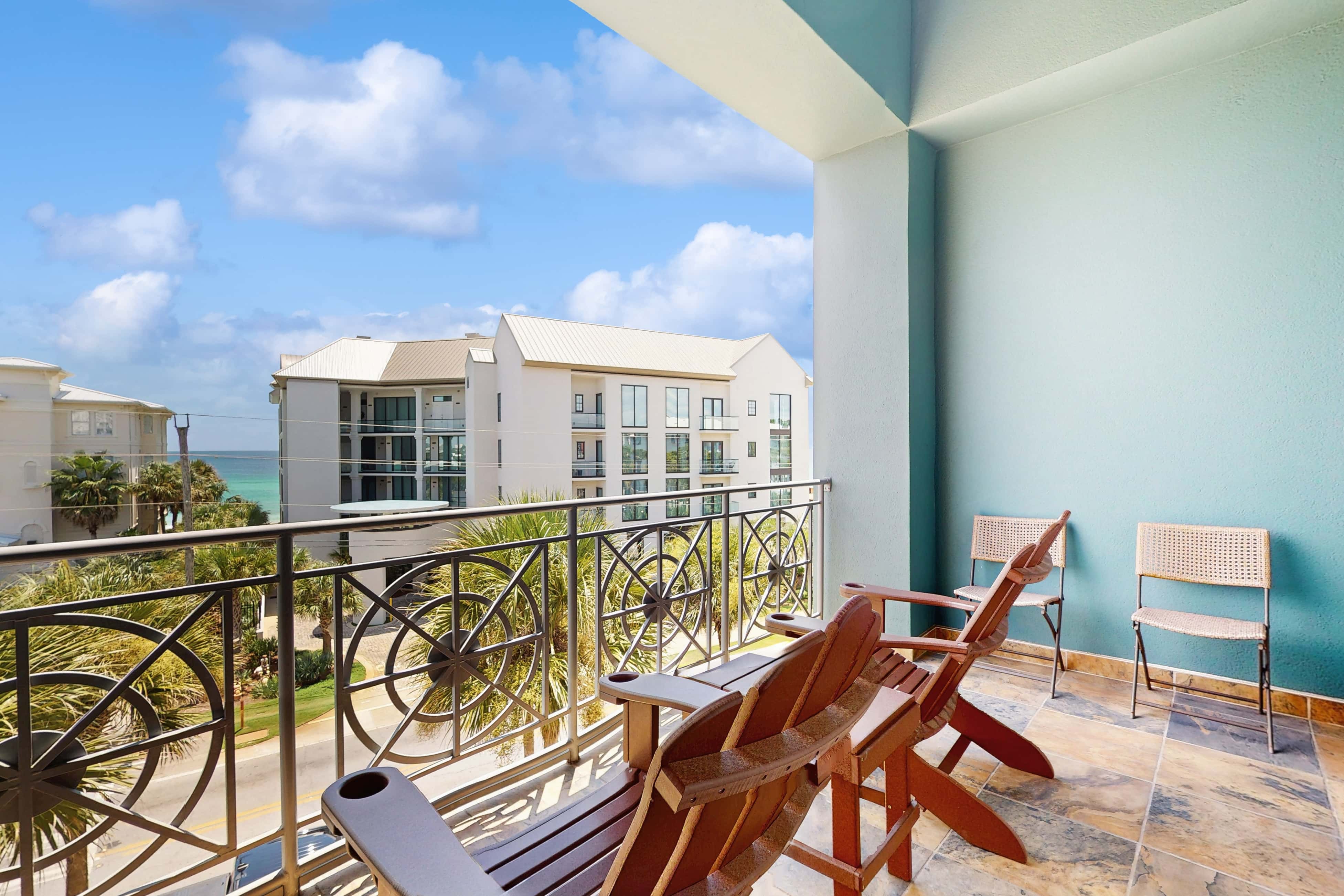 Spacious condo with large living area, private balcony & shared pool