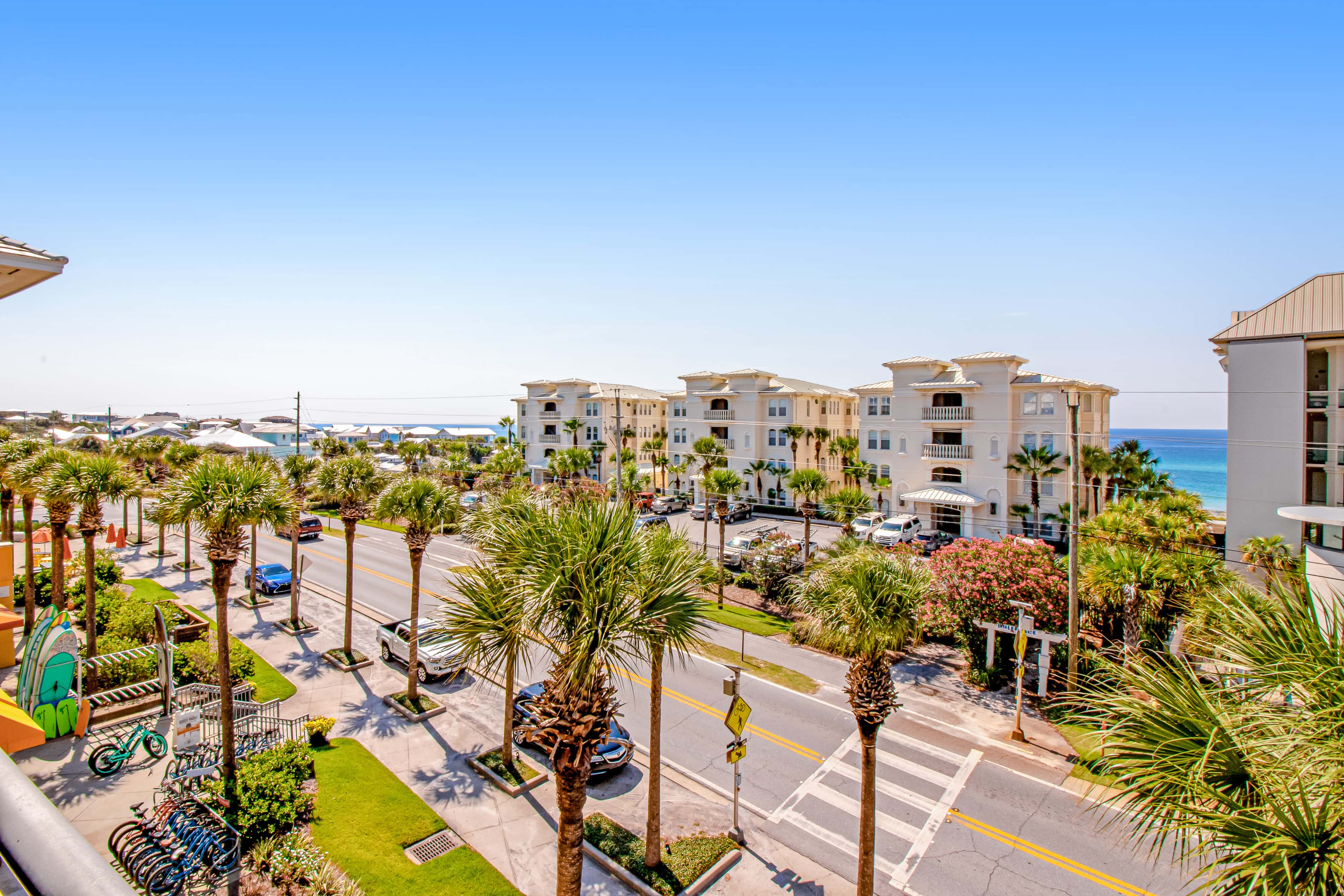 Spacious condo with large living area, private balcony & shared pool