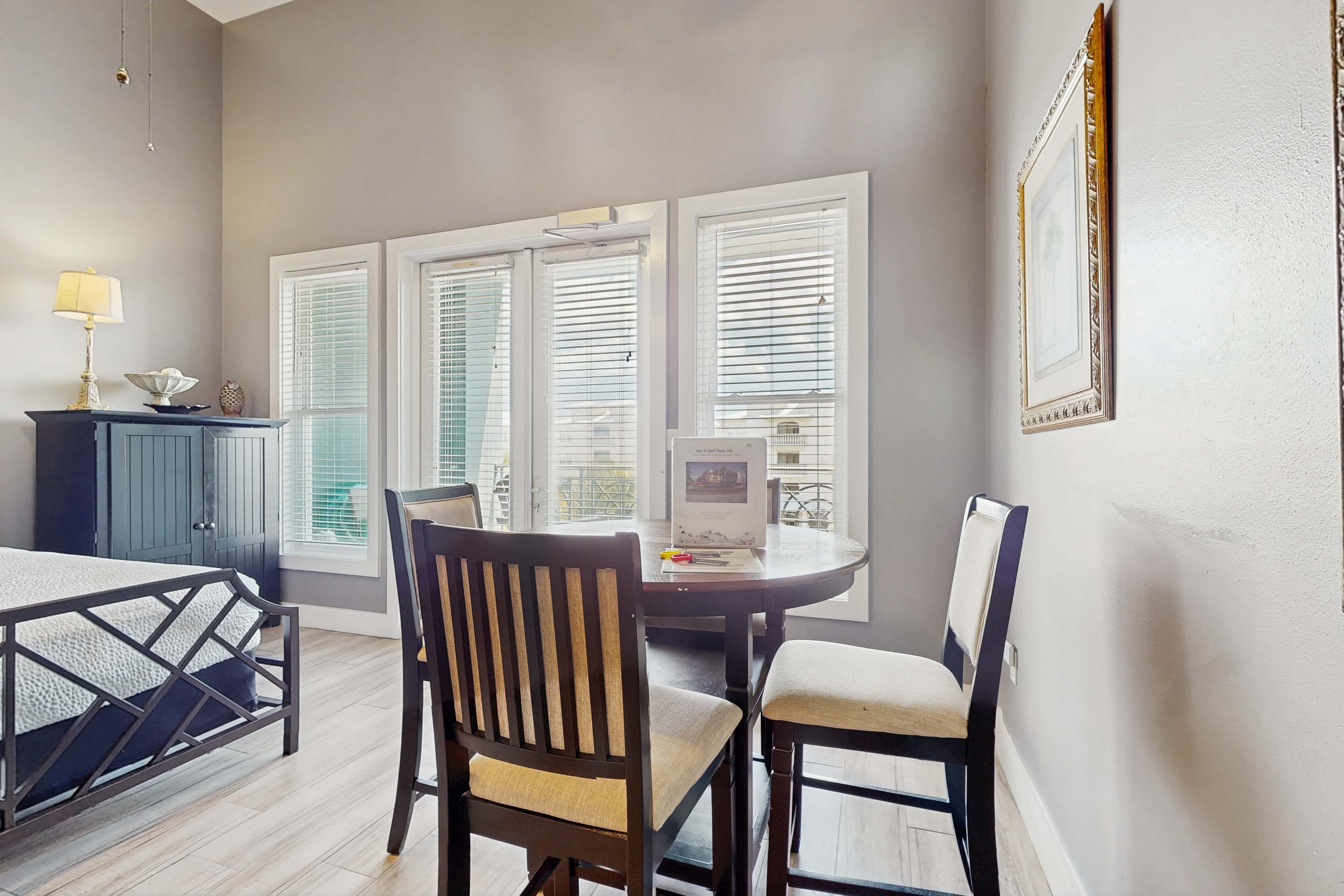 Spacious condo with large living area, private balcony & shared pool