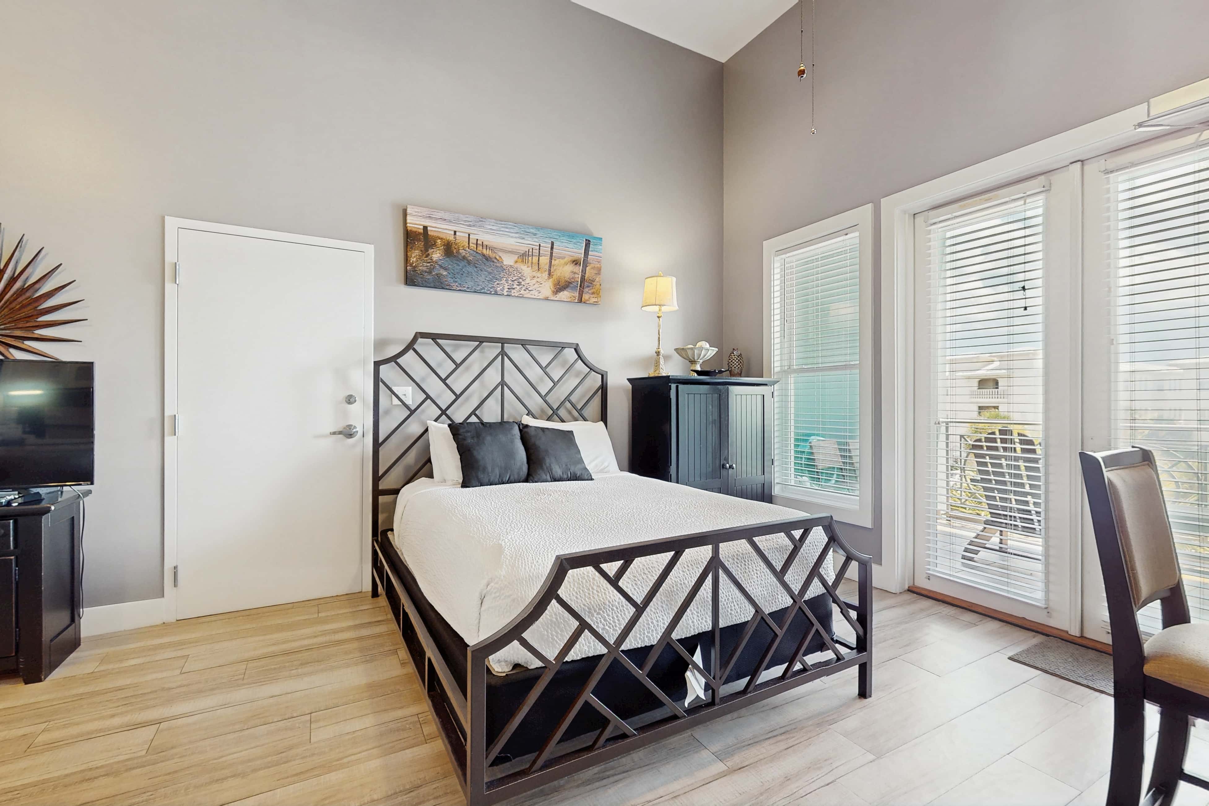 Spacious condo with large living area, private balcony & shared pool