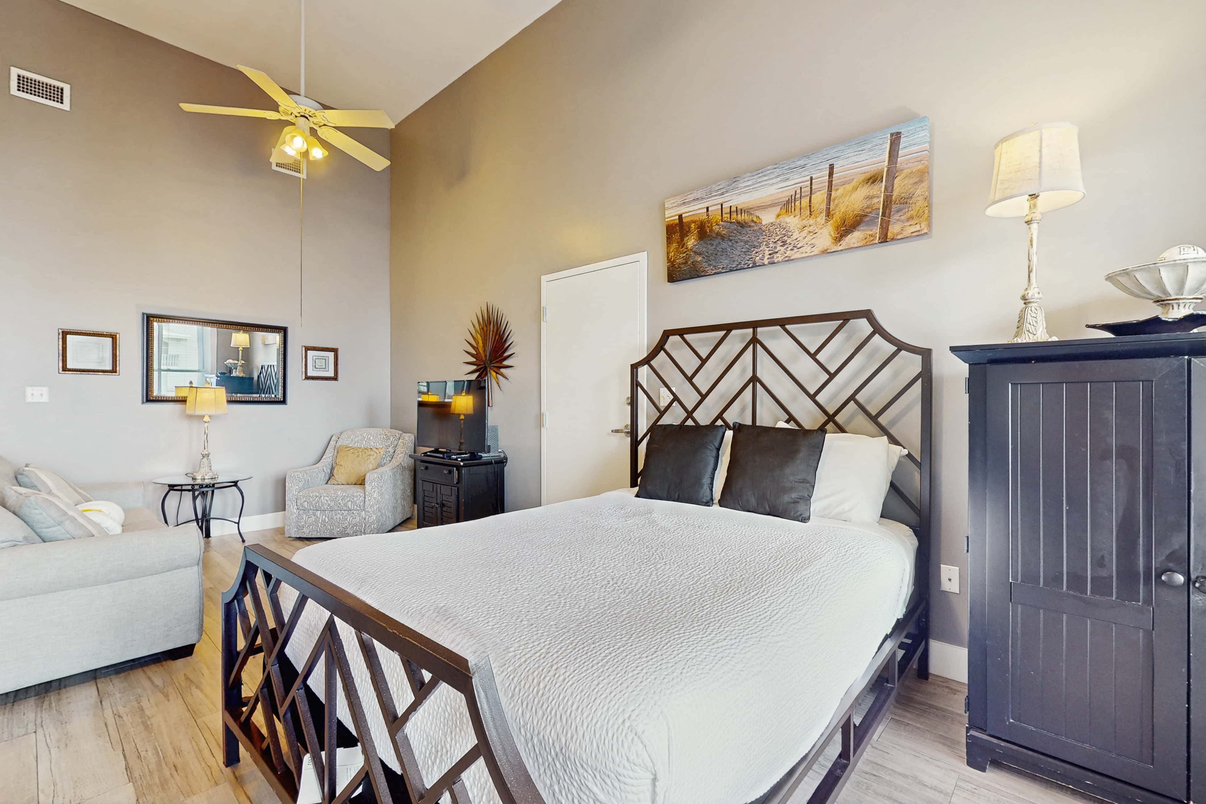 Spacious condo with large living area, private balcony & shared pool