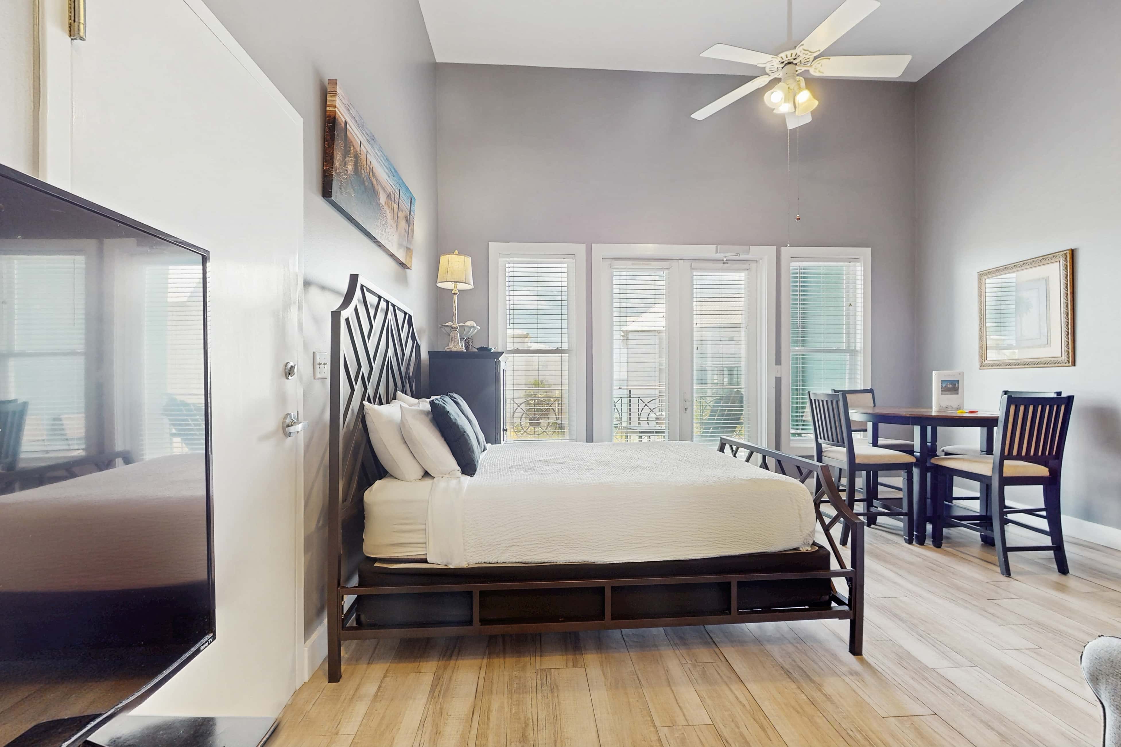 Spacious condo with large living area, private balcony & shared pool