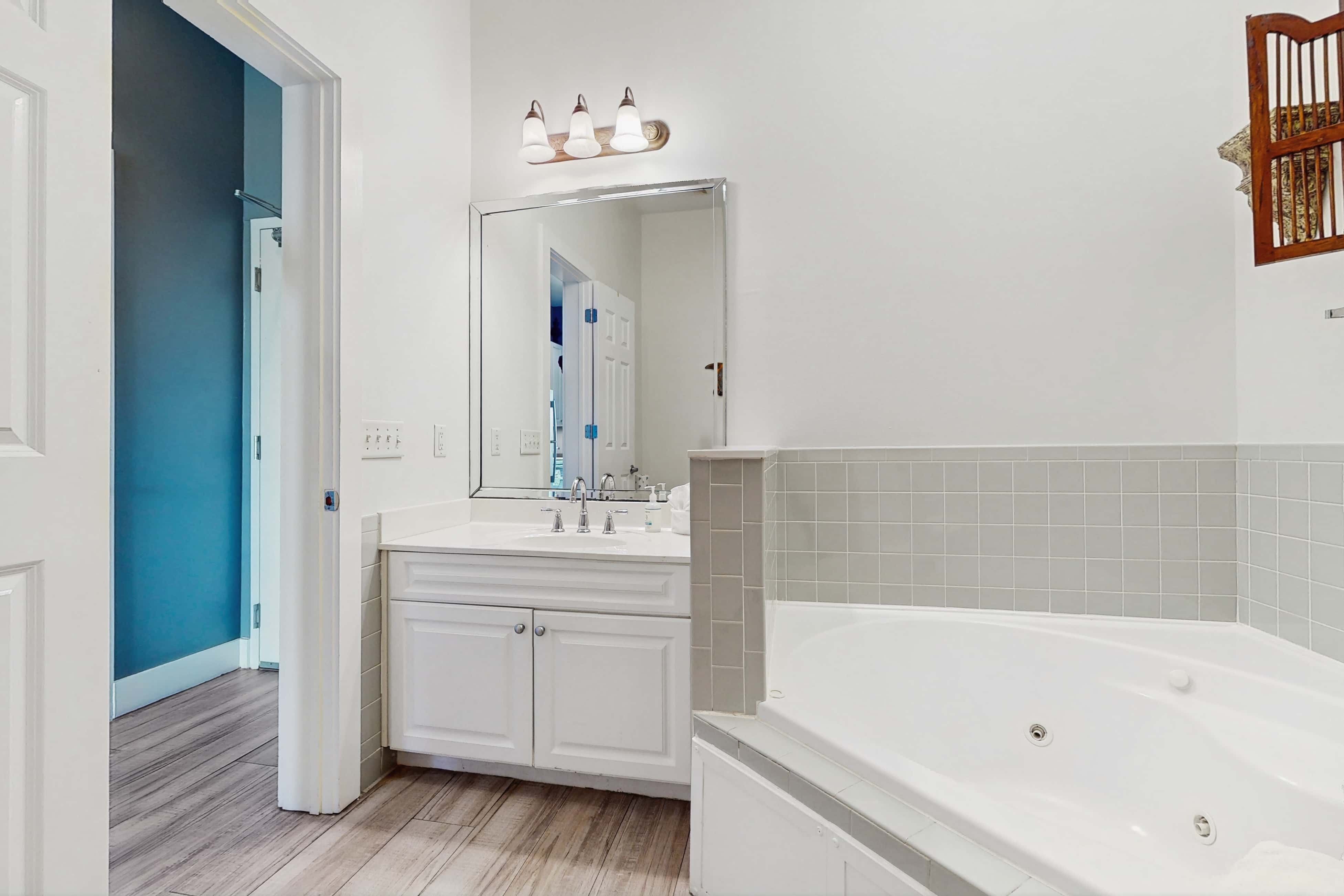 Spacious condo with large living area, private balcony & shared pool