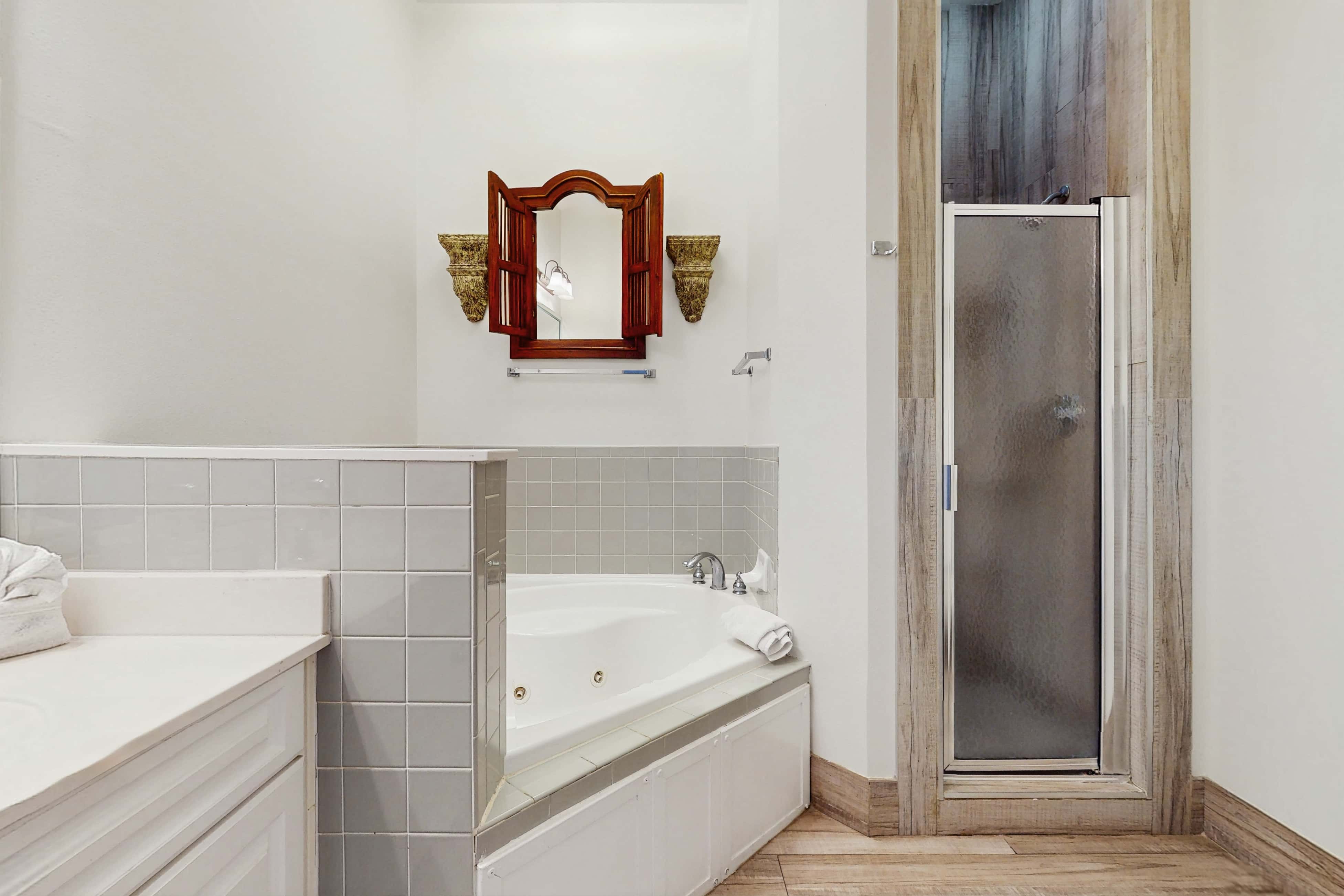 Spacious condo with large living area, private balcony & shared pool