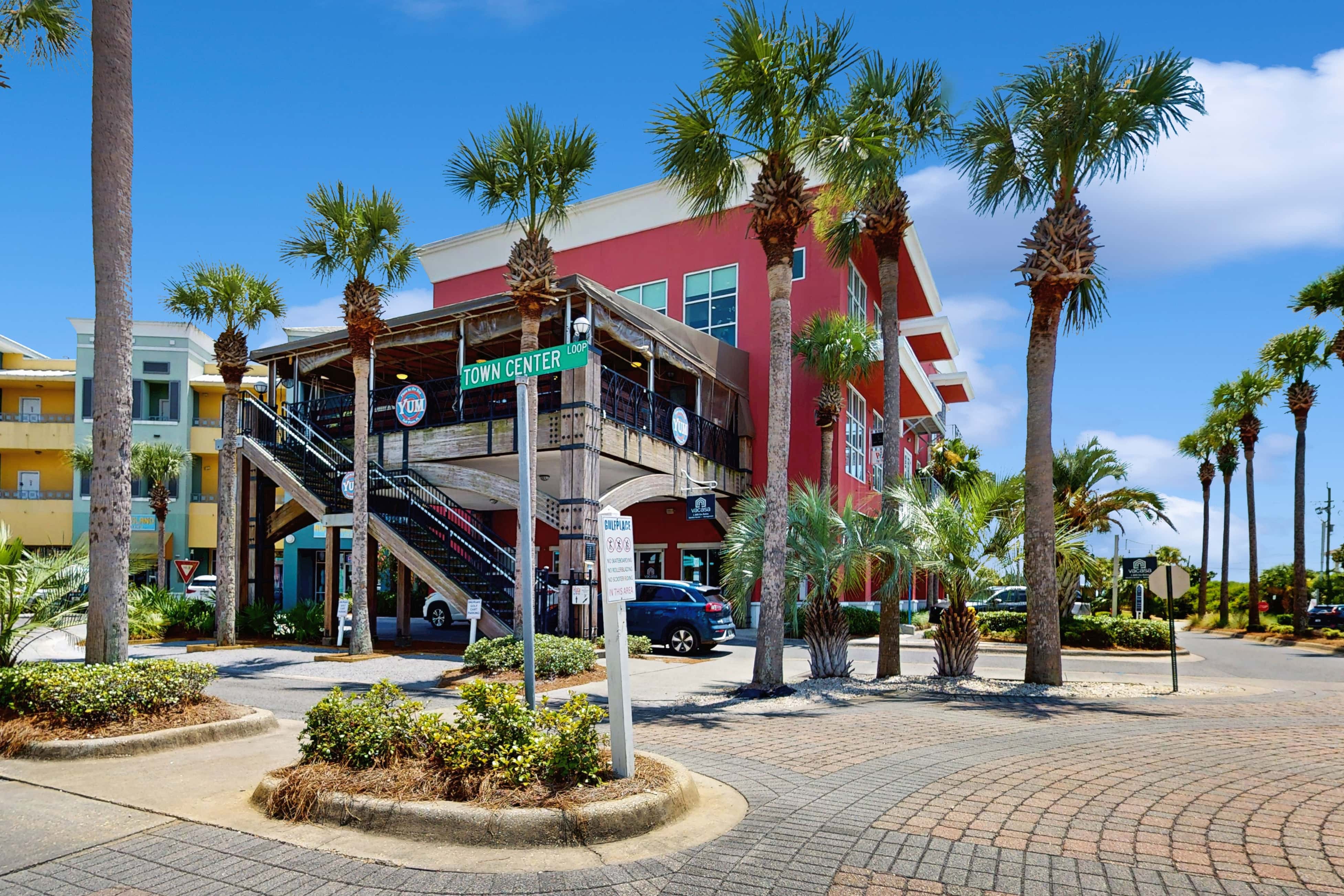 Spacious condo with large living area, private balcony & shared pool