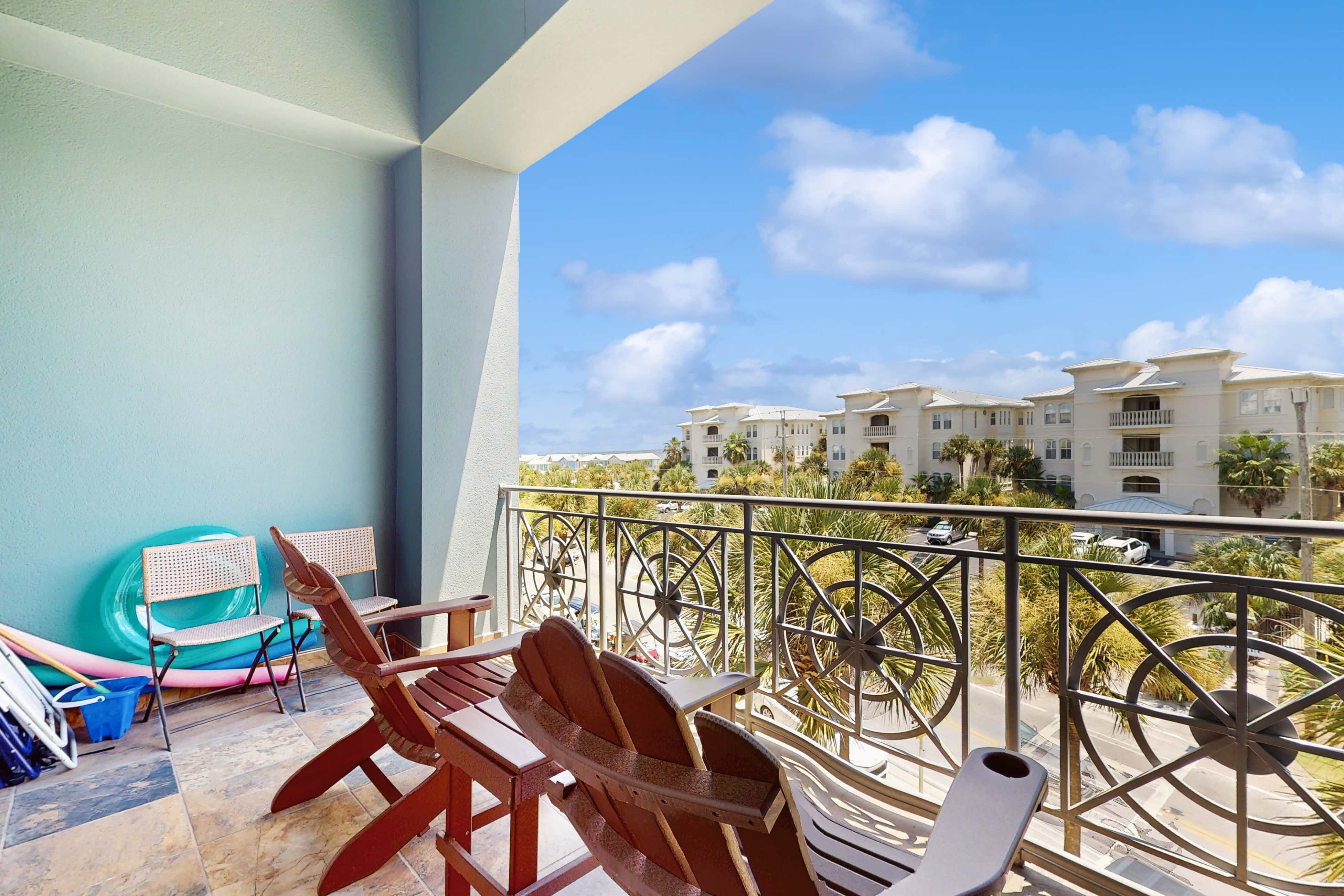 Spacious condo with large living area, private balcony & shared pool