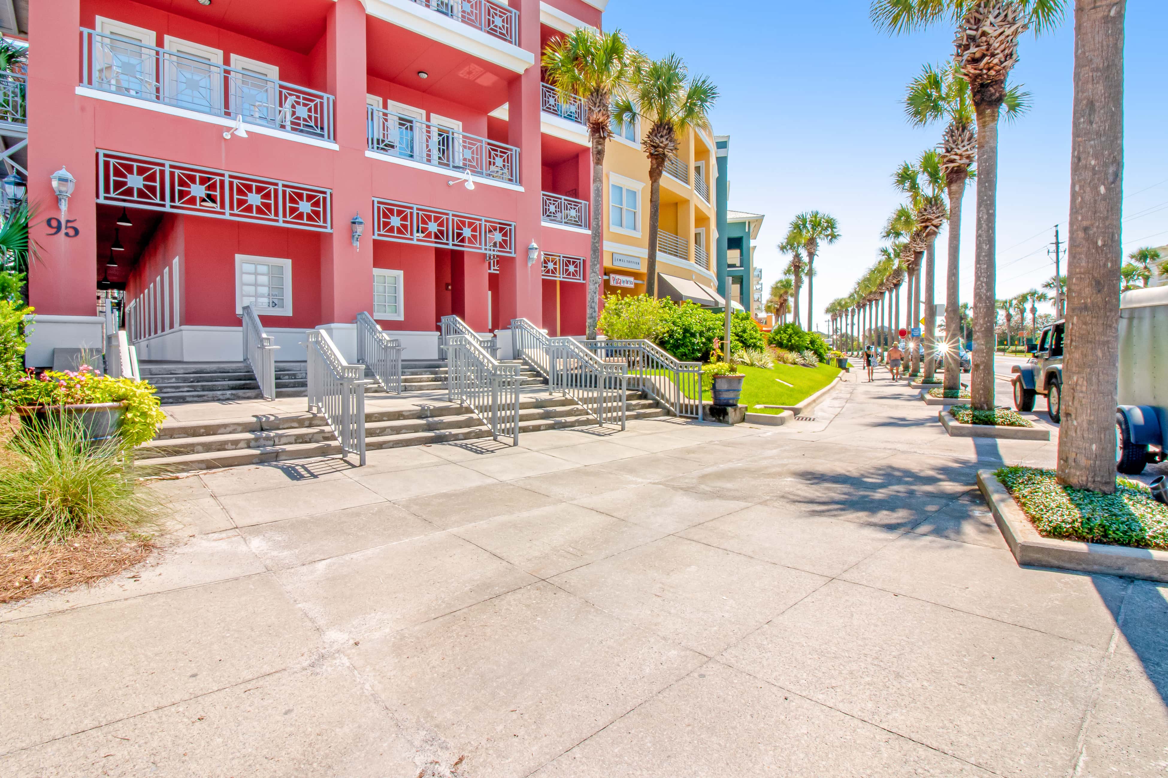 Spacious condo with large living area, private balcony & shared pool