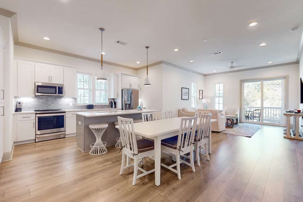 Lake-view condo with a pool, hot tub, & balcony - walking distance to beach