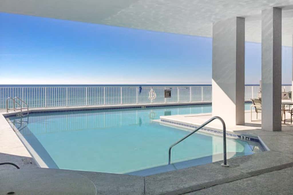 Inviting Gulf front condo In Perdido Key with waterfront pool and hot tub and oceanfront balcony