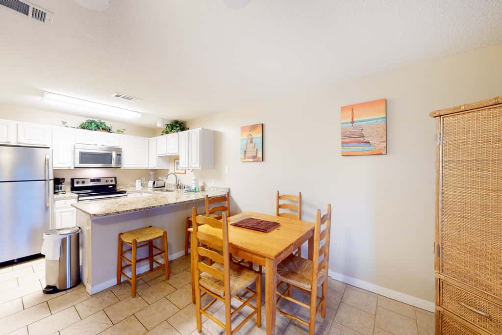 Ground-floor condo with pool, hot tub, & patio - walk to beach