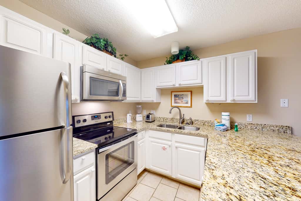 Ground-floor condo with pool, hot tub, & patio - walk to beach