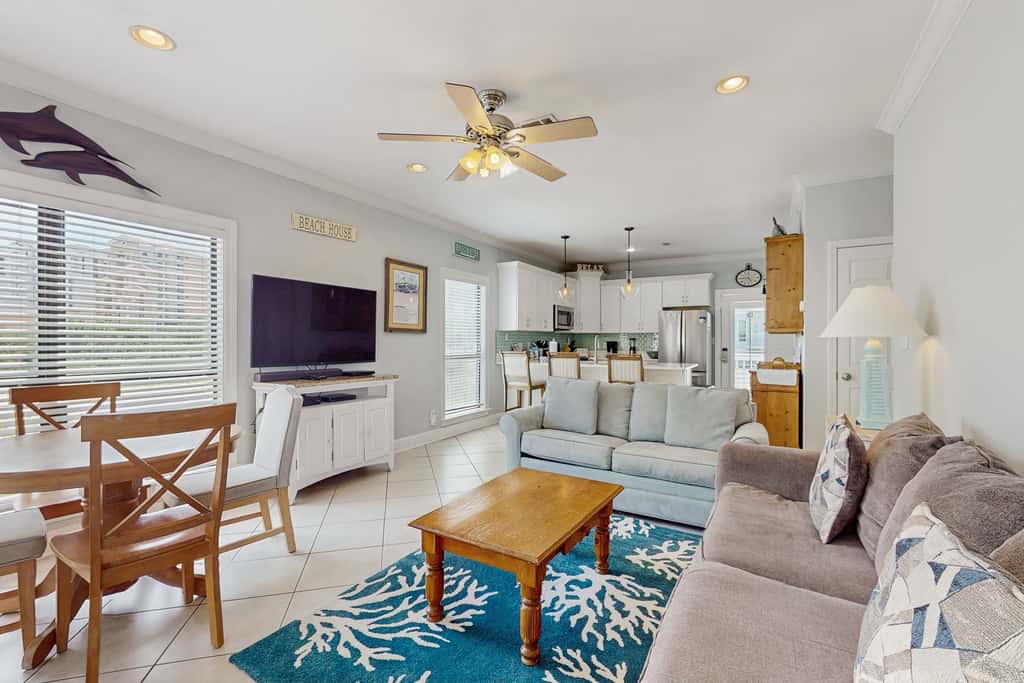 Gorgeous coastal townhome with private balcony, porch, WD,  and shared pool