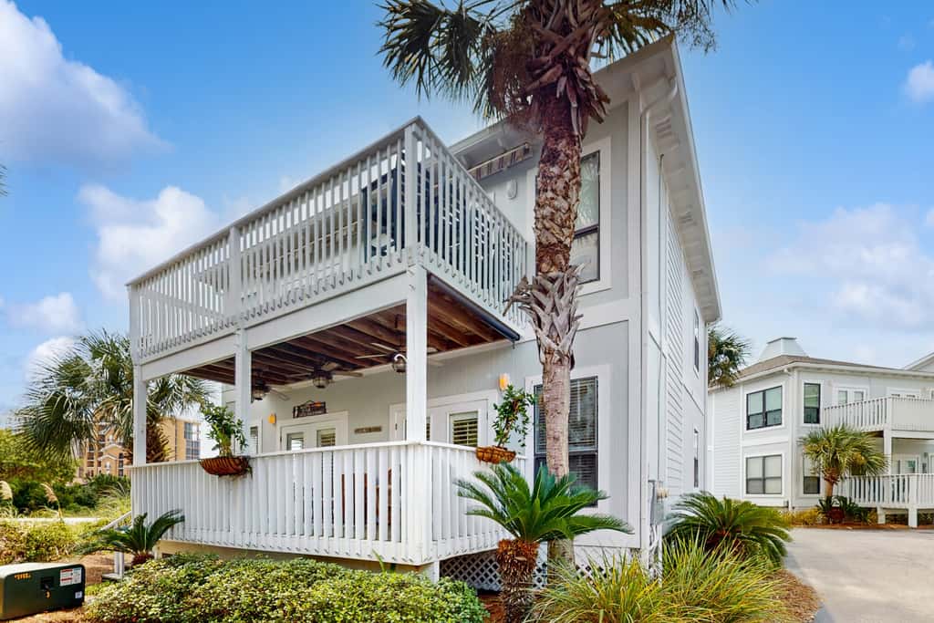 Gorgeous coastal townhome with private balcony, porch, WD,  and shared pool