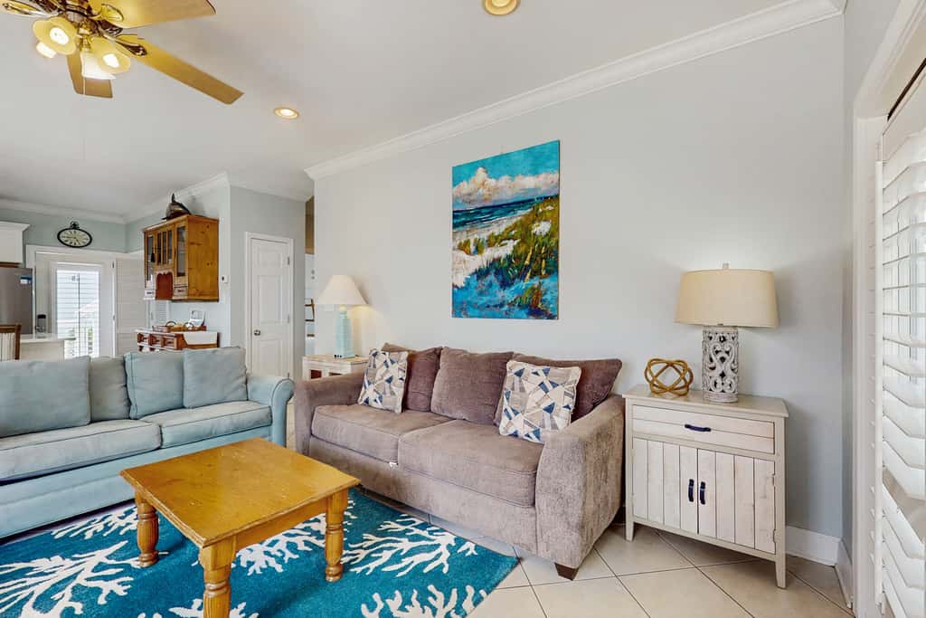 Gorgeous coastal townhome with private balcony, porch, WD,  and shared pool