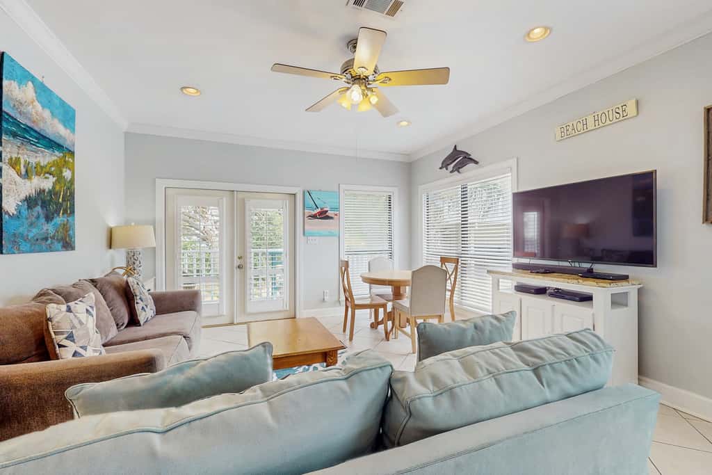 Gorgeous coastal townhome with private balcony, porch, WD,  and shared pool