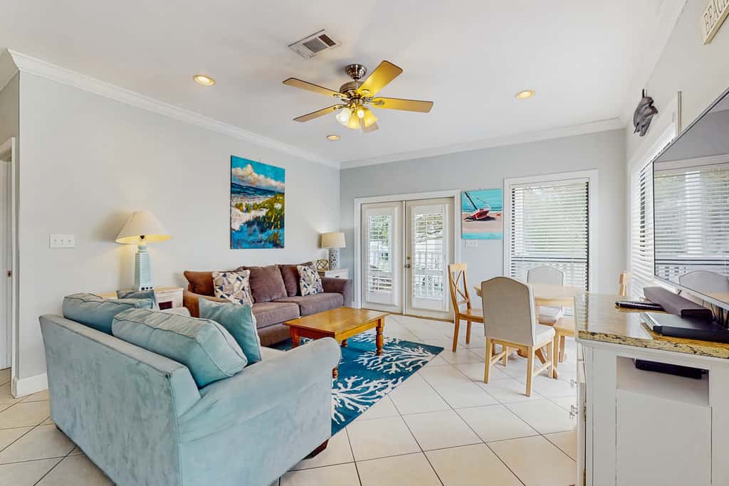 Gorgeous coastal townhome with private balcony, porch, WD,  and shared pool