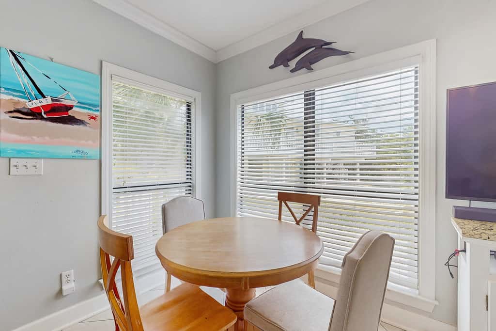 Gorgeous coastal townhome with private balcony, porch, WD,  and shared pool