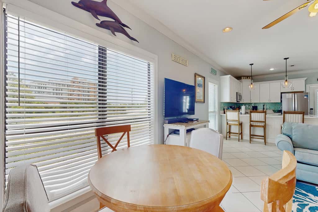 Gorgeous coastal townhome with private balcony, porch, WD,  and shared pool