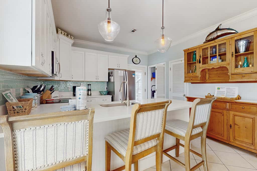 Gorgeous coastal townhome with private balcony, porch, WD,  and shared pool