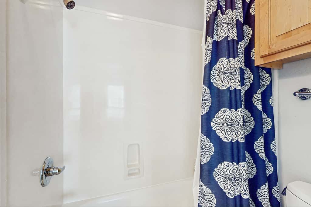 Gorgeous coastal townhome with private balcony, porch, WD,  and shared pool