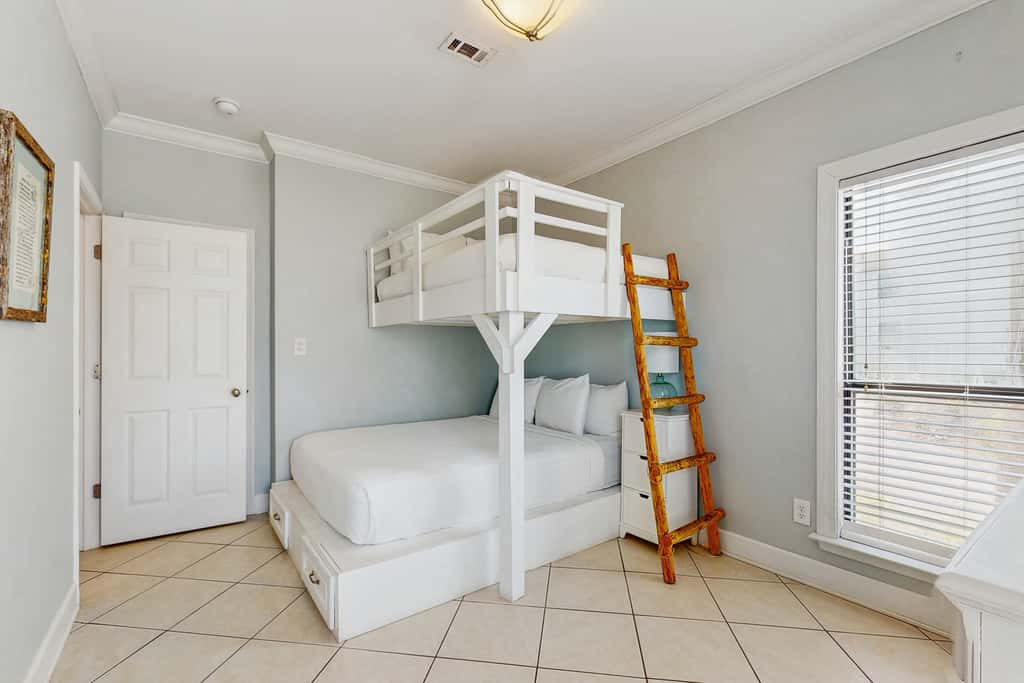 Gorgeous coastal townhome with private balcony, porch, WD,  and shared pool