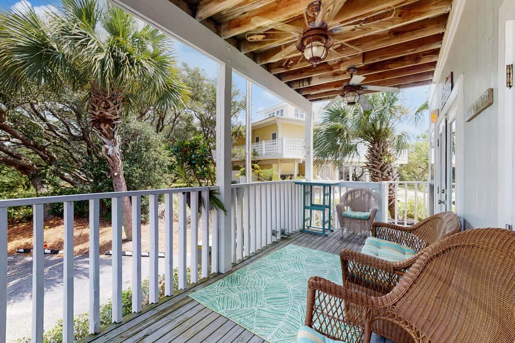 Gorgeous coastal townhome with private balcony, porch, WD,  and shared pool