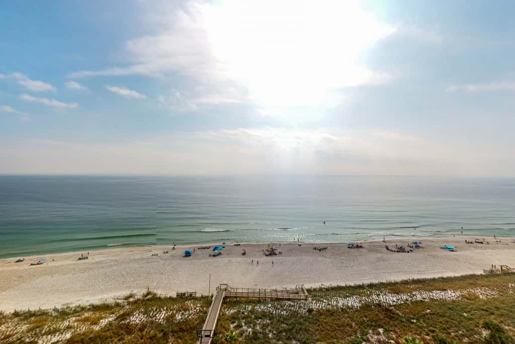 Gulf-front condo with views, pools, a hot tub, and tennis