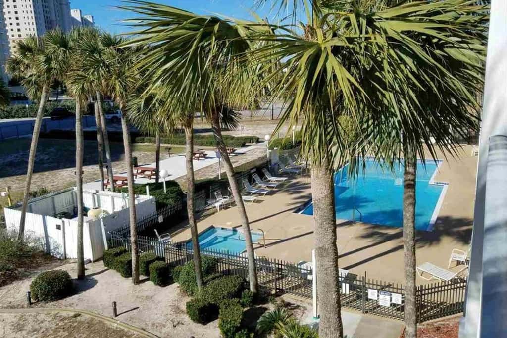 Cozy, top-floor beachfront condo with pool, pool spa, & beach access