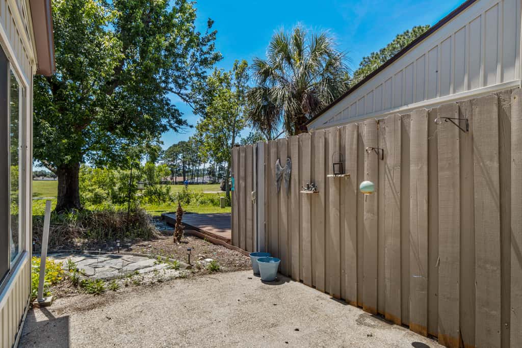 Dog friendly coastal townhome with golf course views, patios, and washer, dryer