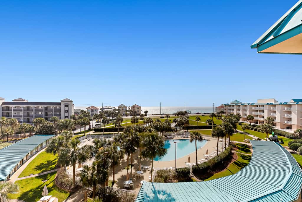 Fourth-floor, ocean-view condo with pool, high-speed WiFi, beach access & W&D