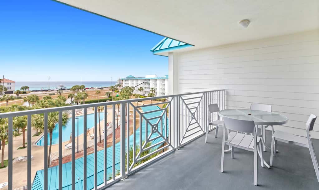 Fourth-floor, ocean-view condo with pool, high-speed WiFi, beach access & W&D