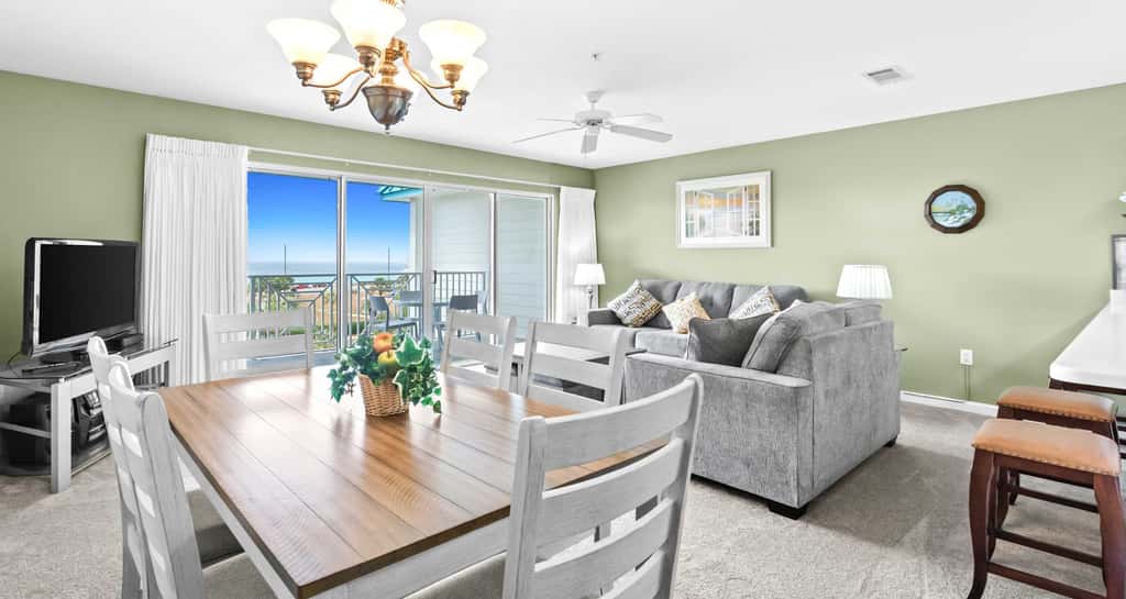 Fourth-floor, ocean-view condo with pool, high-speed WiFi, beach access & W&D