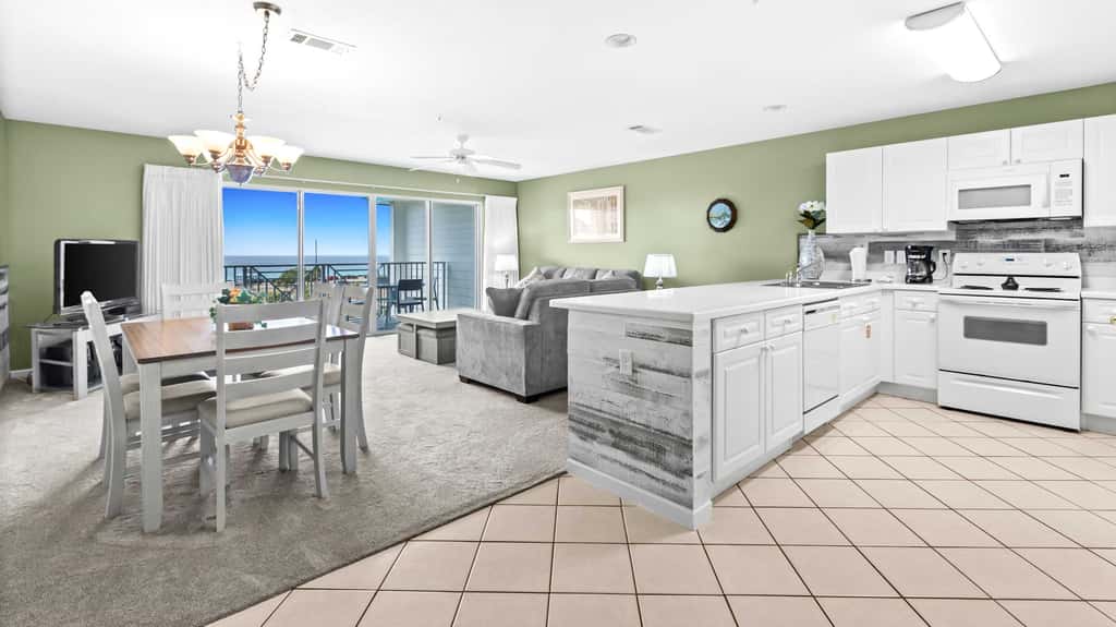 Fourth-floor, ocean-view condo with pool, high-speed WiFi, beach access & W&D