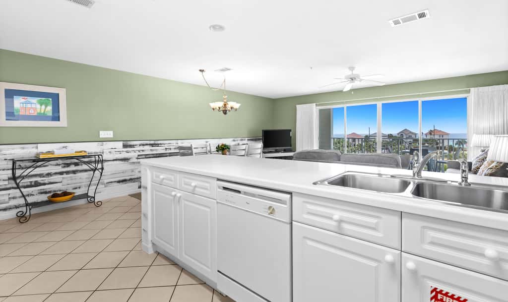 Fourth-floor, ocean-view condo with pool, high-speed WiFi, beach access & W&D
