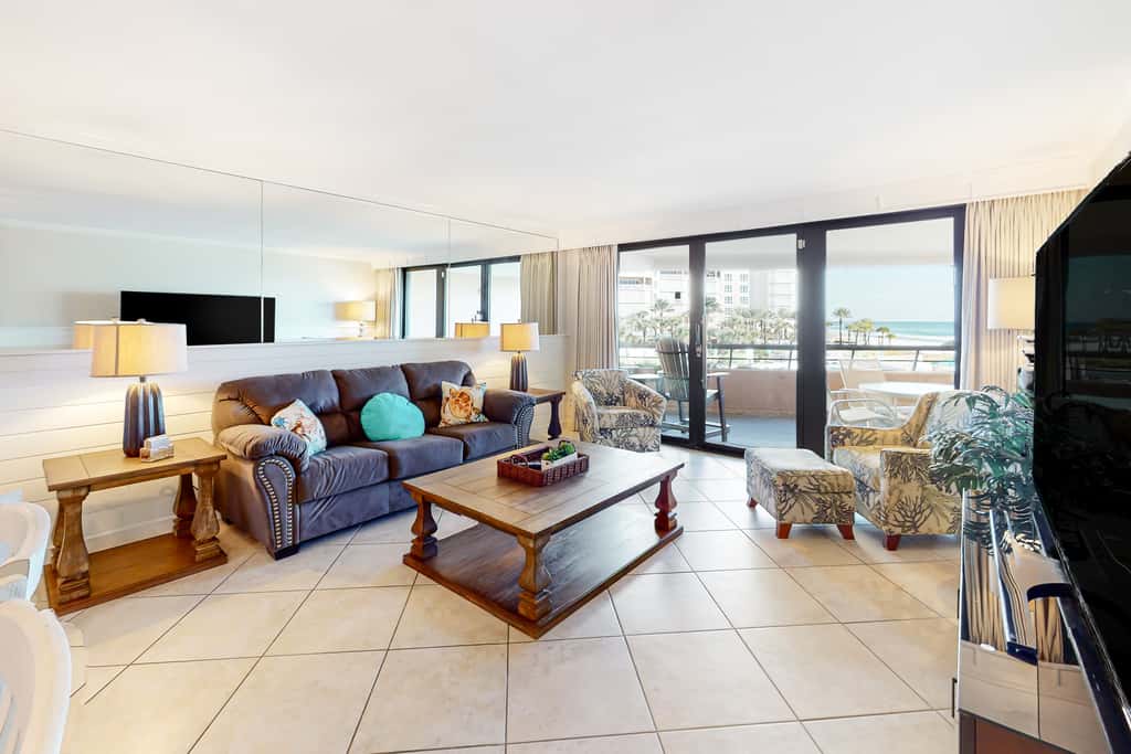 Oceanfront gem with pool, gym, hot tub, AC, W&D & beach-view balcony