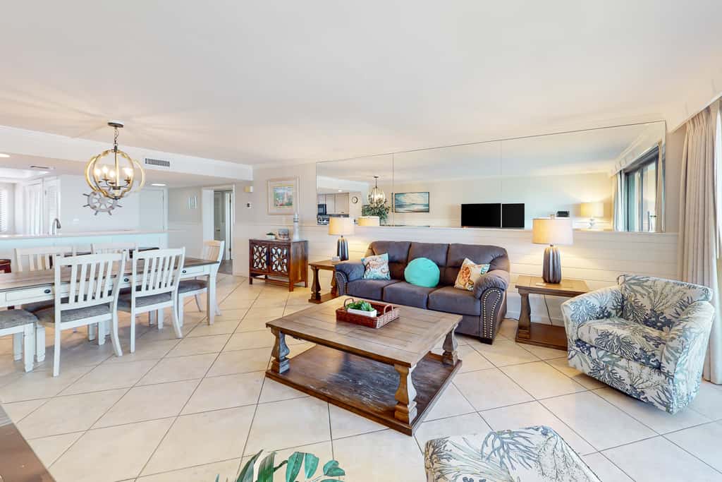 Oceanfront gem with pool, gym, hot tub, AC, W&D & beach-view balcony