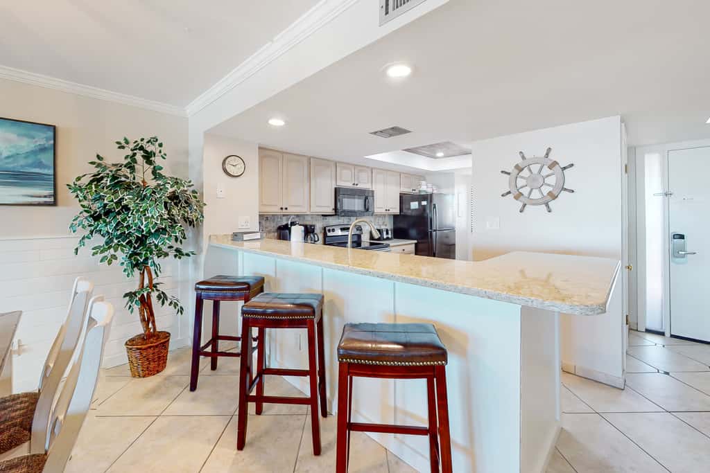 Oceanfront gem with pool, gym, hot tub, AC, W&D & beach-view balcony