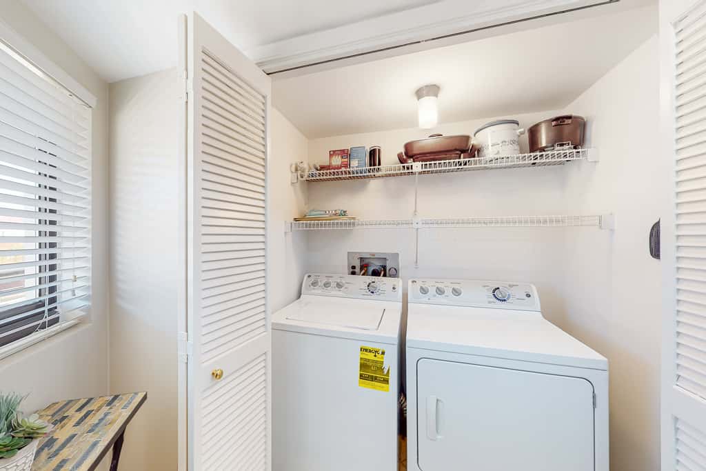 Oceanfront gem with pool, gym, hot tub, AC, W&D & beach-view balcony