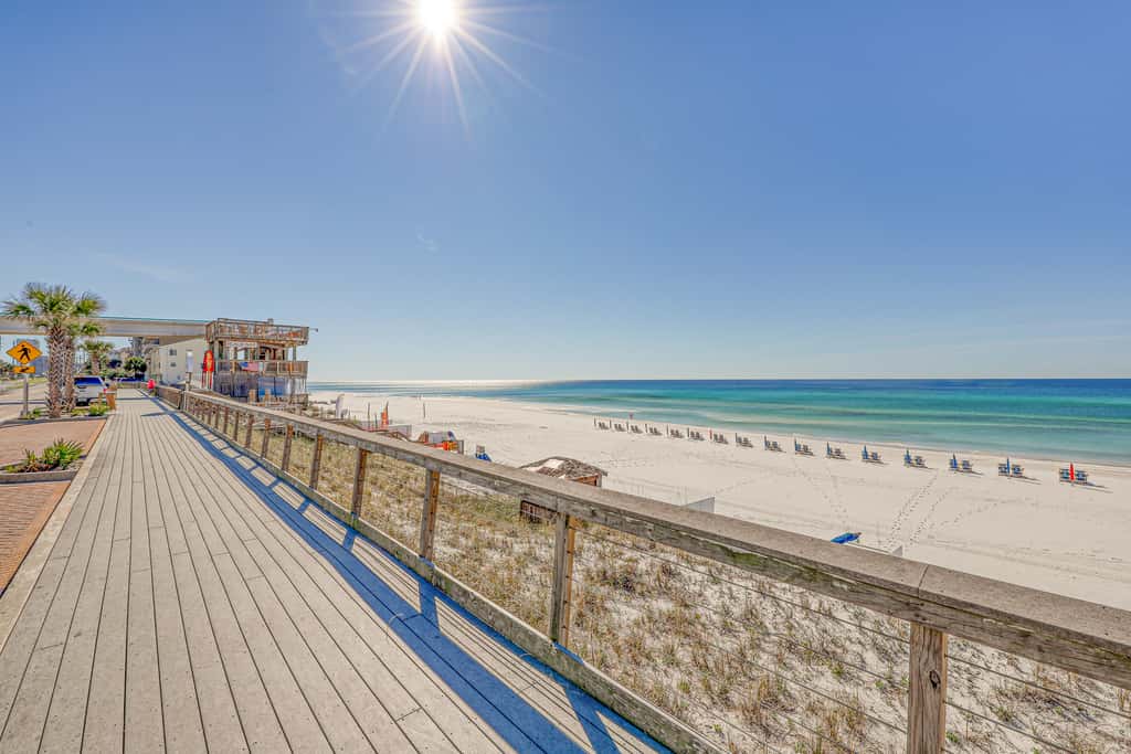 Oceanfront gem with pool, gym, hot tub, AC, W&D & beach-view balcony