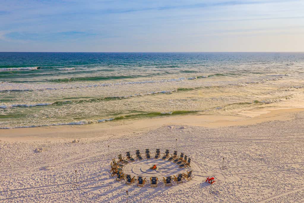 Oceanfront gem with pool, gym, hot tub, AC, W&D & beach-view balcony