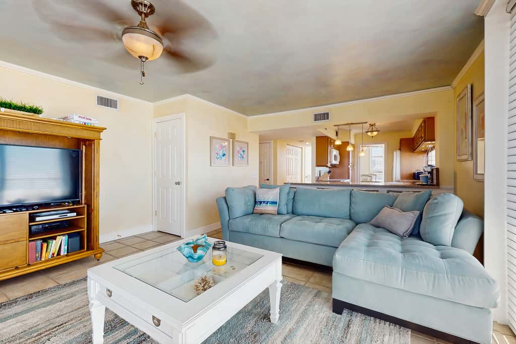Spacious beachfront condo with full kitchen, shared pool and beach access