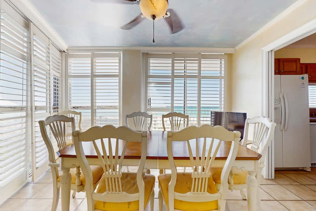 Spacious beachfront condo with full kitchen, shared pool and beach access