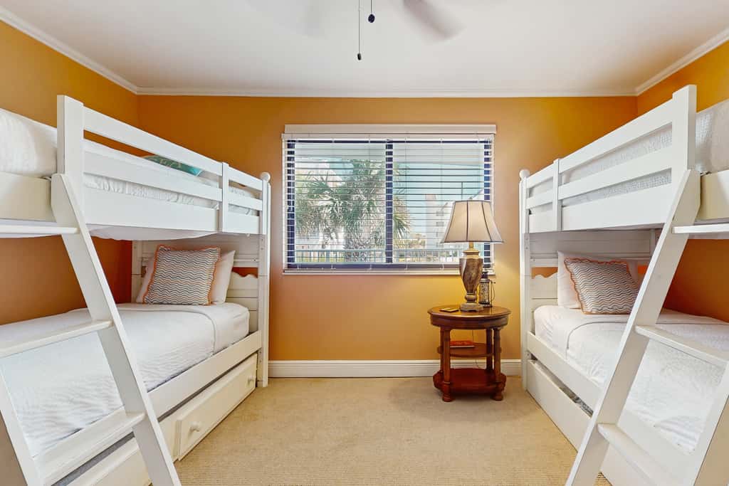 Spacious beachfront condo with full kitchen, shared pool and beach access